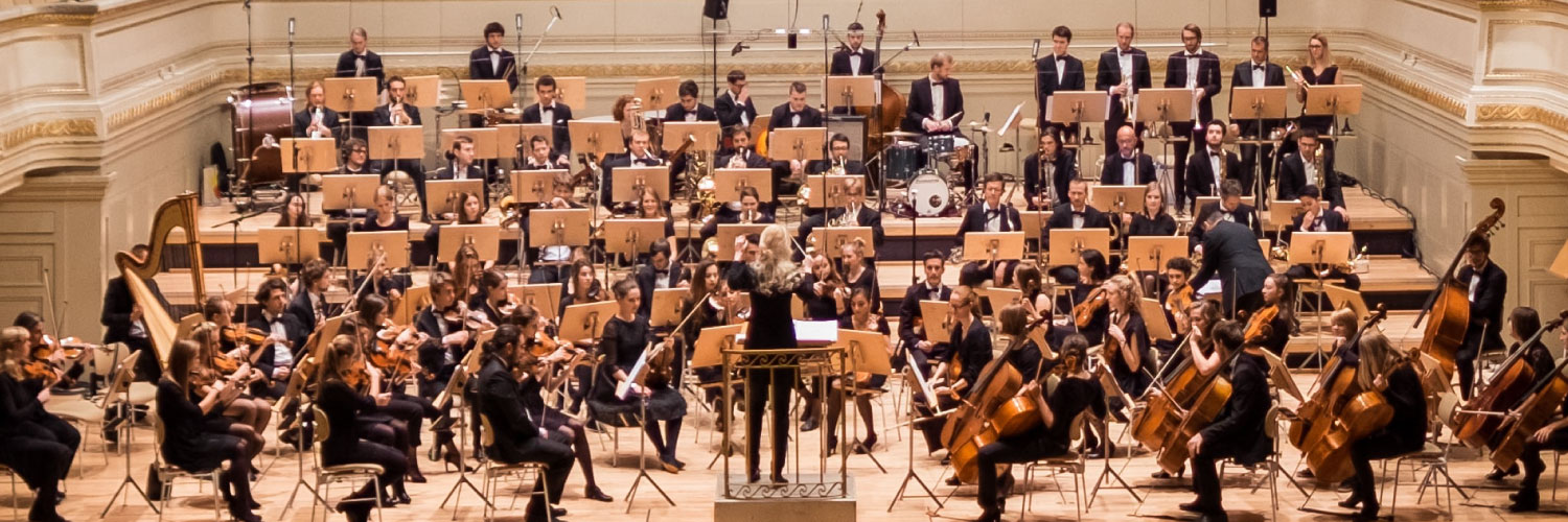  Photo of a symphony orchestra by Manuel Nägeli on Unsplash